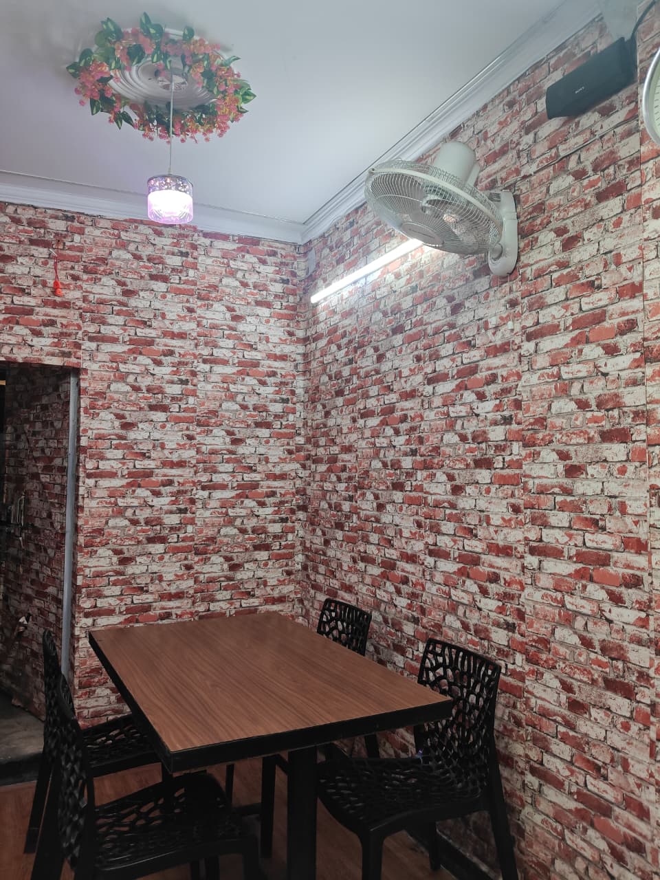 Cozy Brick Wall Dining Booth